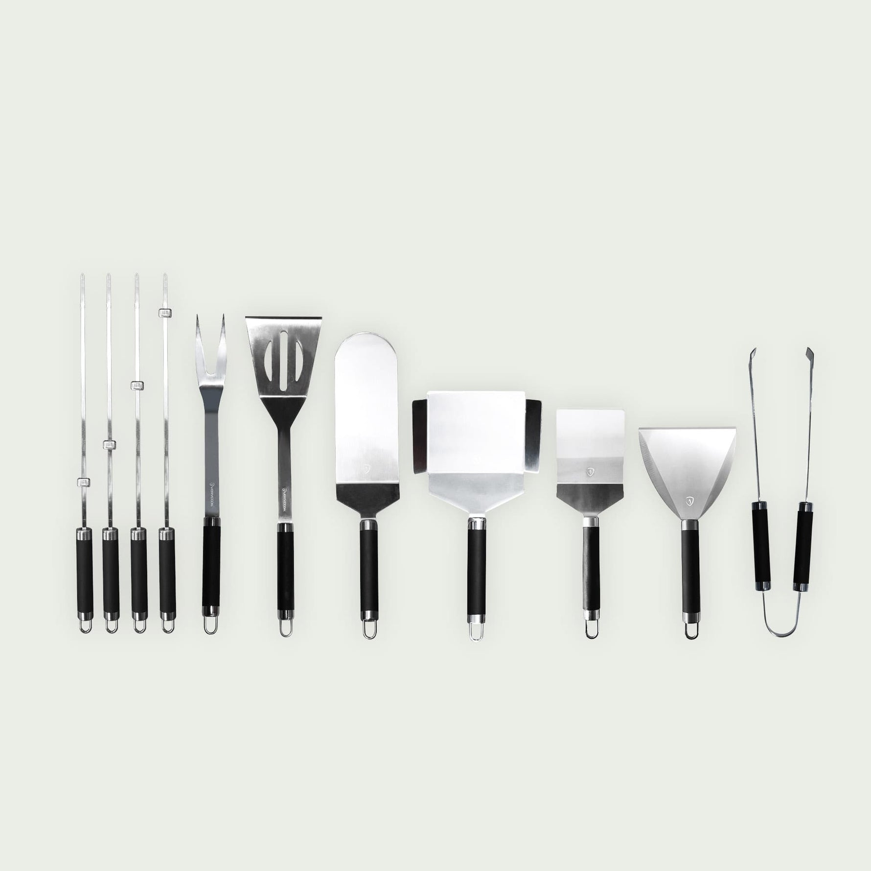 Ensemble complet de 10 ustensiles de cuisson en inox, incluant pinces, fourchette, spatules et brochettes, idéals pour griller, retourner et servir avec précision.