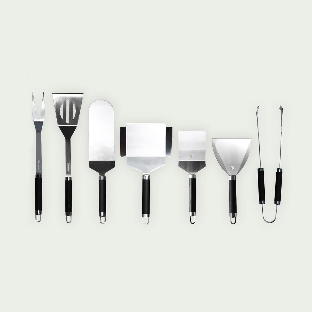 Ensemble complet de 7 ustensiles de cuisson en inox, incluant pinces, fourchette, et spatules, idéals pour griller, retourner et servir avec précision.