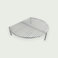Cooking grid, half-moon with folding legs, designed as an extension for Kamado barbecue to add an additional cooking level.