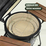 Plan sur la grille de cuisson en inox massif du barbecue Kamado Forest Grill, conçue pour une durabilité maximale et une répartition homogène de la chaleur.