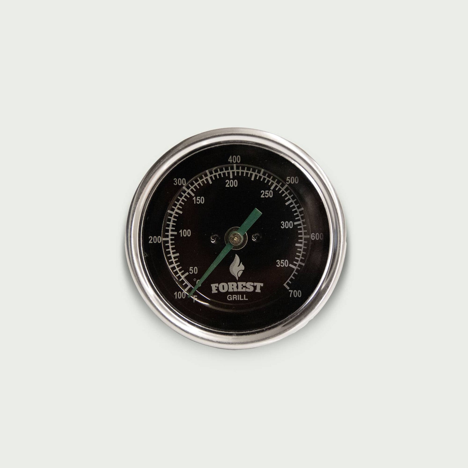 Thermomètre rond Forest Grill pour kamado, cadran noir avec aiguille verte et graduations de température, vu de face sur fond clair.